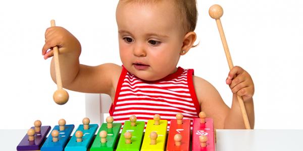 child and xylophone